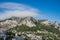 Heavy fog on Monte Solare on Capri Island in summer time with villages on the mountain