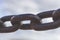 Heavy forged chain on the fence of the Neva embankment.