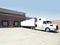 Heavy goods truck loading at warehouse