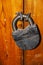 Heavy granary iron lock on a wooden door