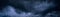 Heavy gray storm clouds. Gloomy sky background for design. Web banner.