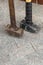 Heavy hammer, a pair of blacksmith tools, forging metal stands on a stone background