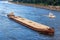 Heavy long barge sailing on the Dnieper river in Kiev, Ukraine