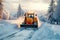 Heavy machinery clears winter road, ensuring safe travel conditions