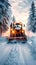 Heavy machinery clears winter road, ensuring safe travel conditions