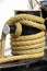 Heavy mooring rope wound around a bollard