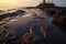 heavy oil spill spreading across the ocean surface near the coast
