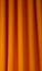 Heavy orange felt textile curtain fold background