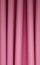 Heavy pink felt pleated textile curtain background