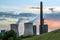 Heavy power plant industry, chimney and towers with pollution at the HKM steelworks in Duisburg, Germany against a cloudy sky at