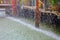 Heavy Rain drop in the water with vintage wooden home on canal.