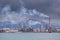 Heavy smoke over an oil refinery