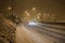 Heavy snow fall on road at night