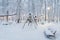 Heavy snowfall in Moscow, children`s playground under the snow. Collapse of public services
