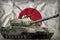Heavy tank with city pixel camouflage on the Japan national flag background. 3d Illustration