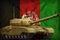 Heavy tank with desert camouflage on the Afghanistan national flag background. 3d Illustration