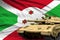 Heavy tank with fictional design on Burundi flag background - modern tank army forces concept, military 3D Illustration