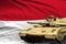 Heavy tank with fictional design on Indonesia flag background - modern tank army forces concept, military 3D Illustration