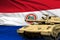 Heavy tank with fictional design on Paraguay flag background - modern tank army forces concept, military 3D Illustration