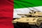 Heavy tank with fictional design on United Arab Emirates flag background - modern tank army forces concept, military 3D