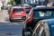 Heavy traffic and queues of parked cars on the side of the street in the Riga, Latvia