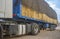 Heavy trailer truck loaded with straw bales