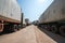 Heavy trucks loaded with goods trailers, parked in waiting area on state border crossing in Vietnam