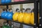 Heavy weight sets of kettlebell on iron racks at the gym used for functional fitness and high intensity physical training