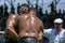 A heavy weight wrestler grimaces whilst competing at the Elmali Turkish Oil Wrestling Festival in Elmali, Turkey