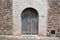 Heavy wooden door as house entrance in Valdemossa, Mallorca, Spa