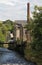 Hebden bridge with view of the river calder with stone houses