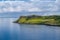 Hebrides islands cape and scottish village under the hills.