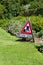 Hedge cutting sign in country garden