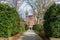 Hedge-lined entrance to the Westwerk of Corvey Castle in Hoexter in Germany