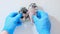 Hedgehogs on examination at the veterinarian.Medicine for animals. Two small newborn hedgehogs in the hands of a