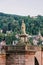 Heidelberg, Germany - Aug 1, 2020: Roman goddess Minerva sculpture on old bridge after sunset