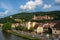 HEIDELBERG, GERMANY - JUNE 4, 2017: Panoramic view of Heidelberg castle over the tile roofs of old town from Carl Theodor bridge