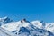 Heiligenblut - Gondola going up and down above the snowy peaks