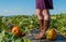 Heirloom Pumpkin at feet of relaxed woman