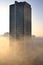 Helbor commercial building enveloped by fog at dawn in the city