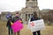 Helena, Montana - April 19, 2020: Demonstrators at a protest in the Capitol wearing masks, gloves, and holding signs for freedom