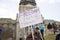 Helena, Montana - April 19, 2020: A man protesting holding a freedom from tyranny sign at a protest at the Capitol of the shutdown