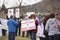 Helena, Montana - April 19, 2020: Red headed woman holding a sign wanting to get back to work due to the Coronavirus shutdown of