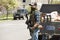 Helena, Montana - May 20, 2020: An armed man, militia member, protest at the Capitol building, holding a semi-automatic weapon in