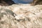 Heli hiking on the glacier floor high up in the Southern alps mountain peaks on Fox