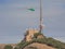 Helicopter approaching communications tower of Sant Jeroni