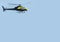 Helicopter Chopper black with blue sky background for editors text copy