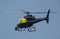 Helicopter Chopper black with blue sky background for editors text copy