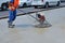 Helicopter concrete finishing