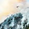 Helicopter extinguishes forest fire on the slope of fuming mount